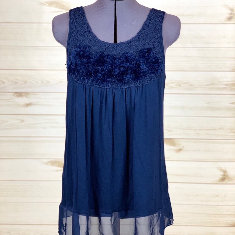 Navy tunic with texture and ruffle on chest